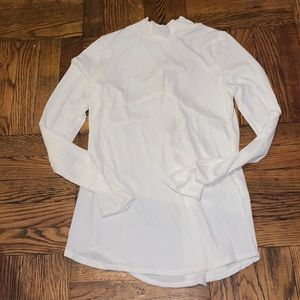 White mini turtle neck long sleeve tie back shirt
